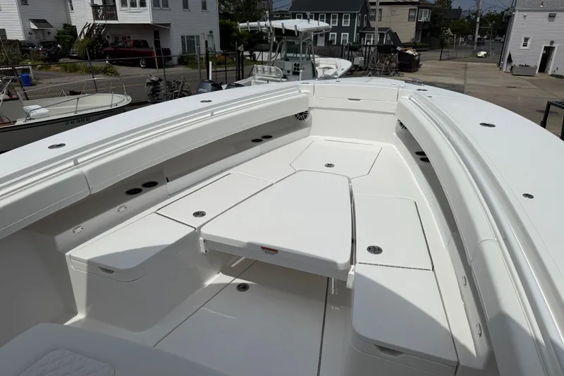 Slide: The Image of 2026 Regulator 31 boat interior with spacious seating and storage compartments. - 24