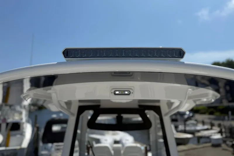 Slide: The Image of 2026 Regulator 31 boat top view with sleek design and modern features. - 39