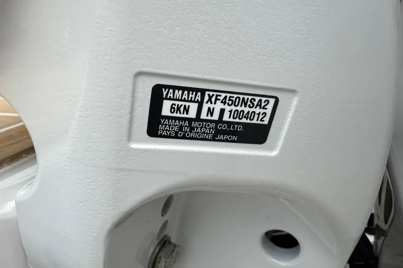 Slide: The Image of Yamaha motor label on Regulator 31, 2026 model, showing serial and model numbers. - 64