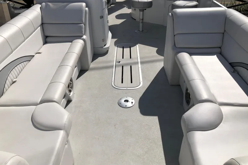 Slide: The Image of 2015 Avalon Catalina Entertainer boat interior with plush seating and sleek design. - 3