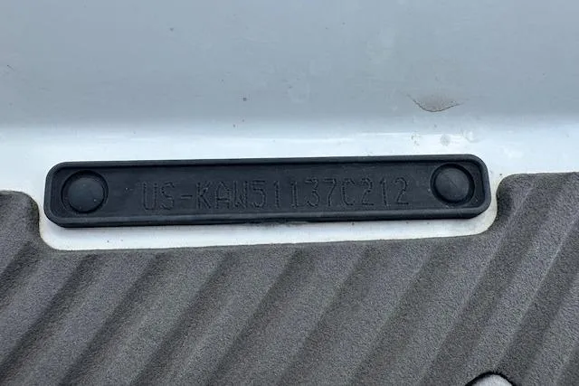 Slide: The Image of 2012 Kawasaki Ultra LX identification plate with serial number on textured surface. - 9