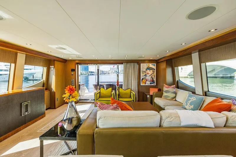 Slide: The Image of Luxurious interior of 2013 Hatteras 80 Motor Yacht with modern decor and waterfront view. - 28