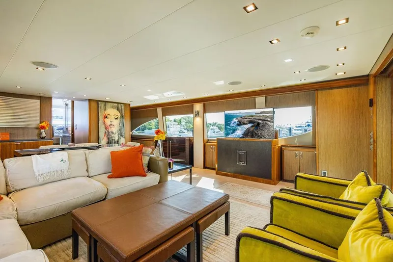 Slide: The Image of Luxurious interior of 2013 Hatteras 80 Motor Yacht with elegant seating and decor. - 33
