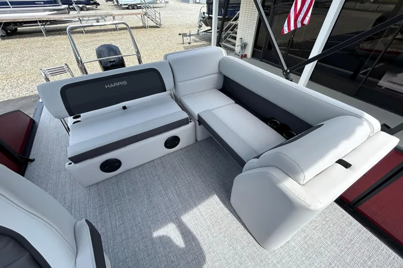 Slide: The Image of 2026 Harris FloteBote Cruiser 210 SL interior with plush seating and modern design. - 13