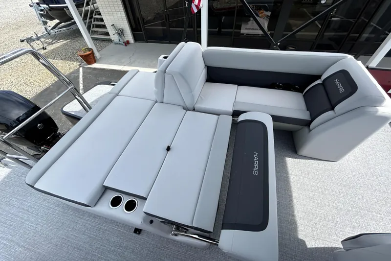 Slide: The Image of 2026 Harris FloteBote Cruiser 210 SL pontoon boat with luxurious seating and modern design. - 14