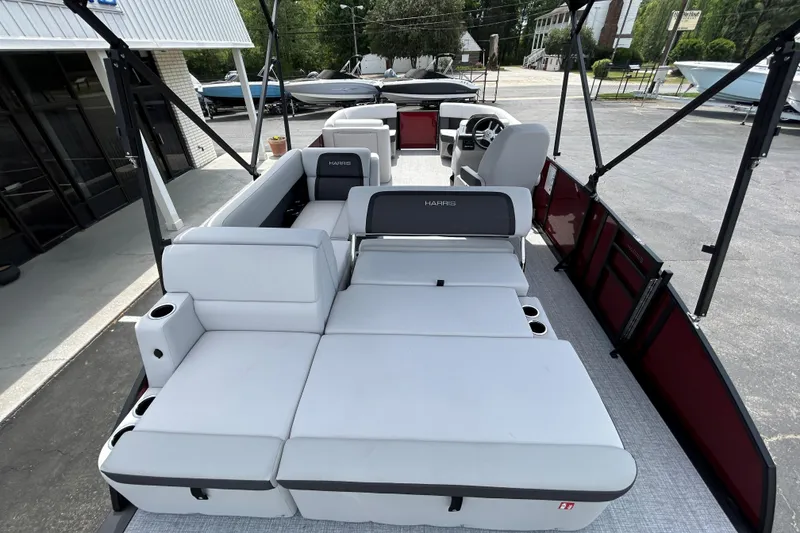 Slide: The Image of 2026 Harris FloteBote Cruiser 210 SL pontoon boat with spacious seating and modern design. - 15