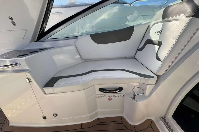 Slide: The Image of Interior seating of 2013 Monterey 260 SCR Sport Cruiser with stylish white and gray upholstery. - 14