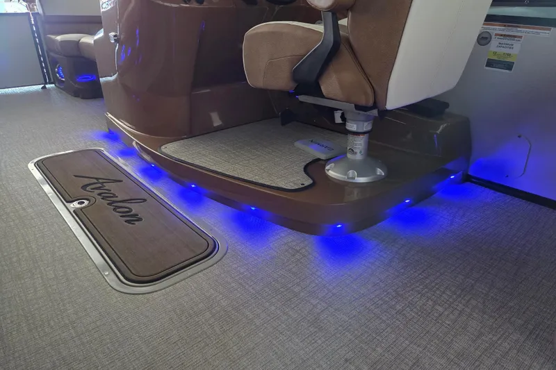 Slide: The Image of 2023 Avalon Platinum 2385 Catalina Quad Lounger interior with blue LED lighting. - 15