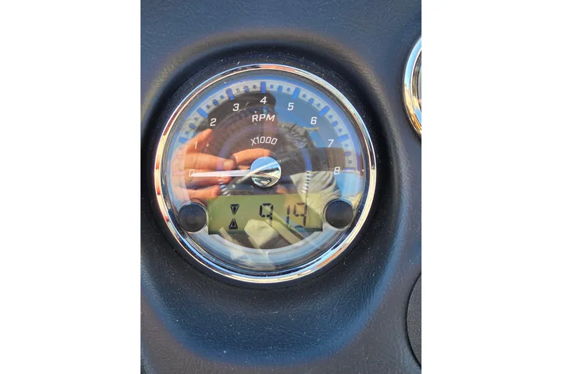 Slide: The Image of Close-up of RPM gauge on 2023 Avalon Platinum 2385 Catalina Quad Lounger. - 9