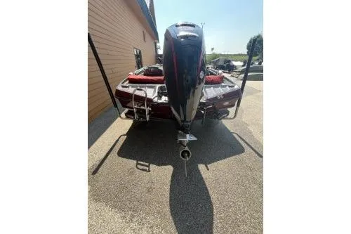 Slide: The Image of 2020 Ranger Z175 boat, rear view, parked outdoors, showcasing motor and sleek design. - 5