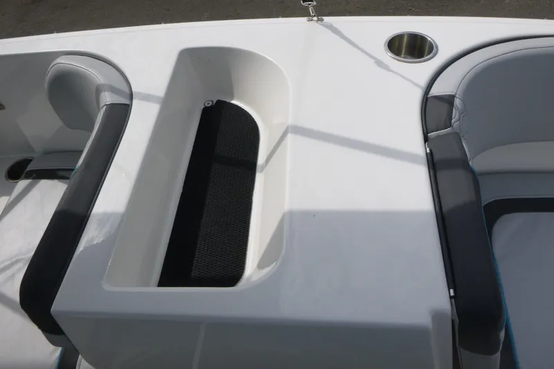Slide: The Image of 2022 Bayliner Element M17 boat interior seating and storage area. - 10