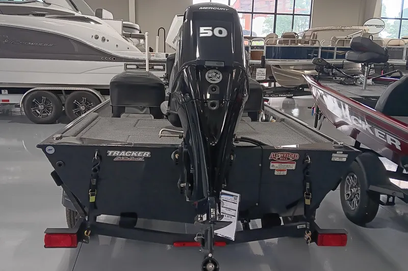 Slide: The Image of 2025 Tracker Bass Tracker Classic XL boat with Mercury 50 engine in showroom. - 4