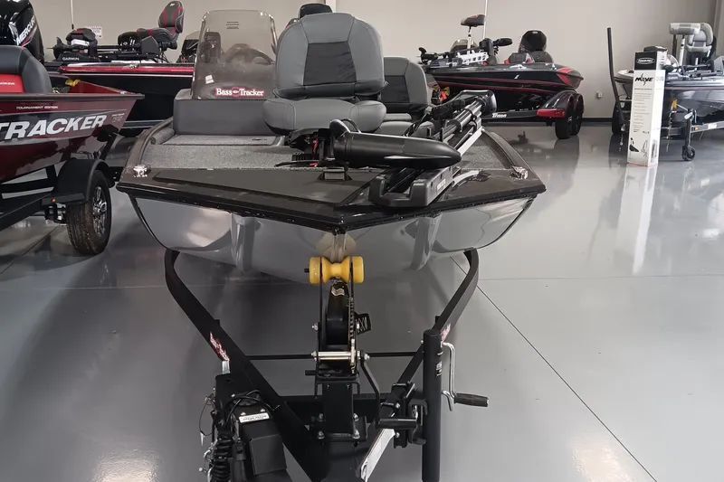 Slide: The Image of 2025 Tracker Bass Tracker Classic XL boat displayed in showroom, front view. - 5