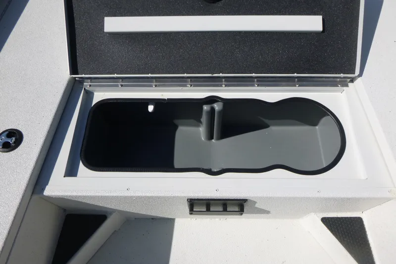 Slide: The Image of Open storage compartment in 2025 Ranger RB210 boat. - 11