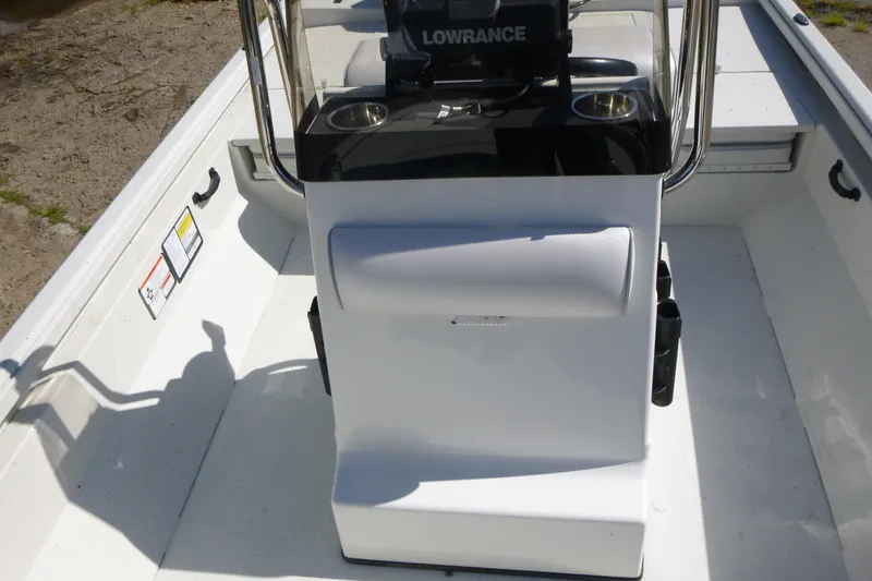Slide: The Image of 2025 Ranger RB210 boat console with Lowrance electronics and cup holders. - 13