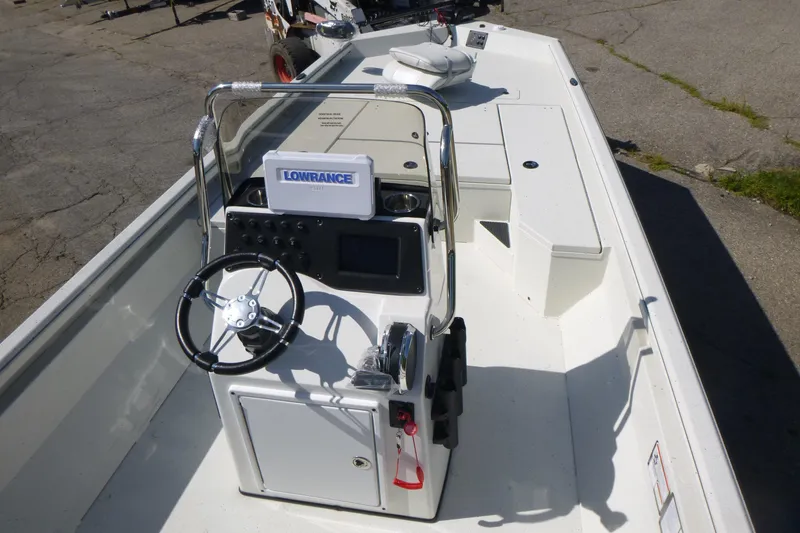 Slide: The Image of 2025 Ranger RB210 boat interior with steering console and navigation equipment. - 5