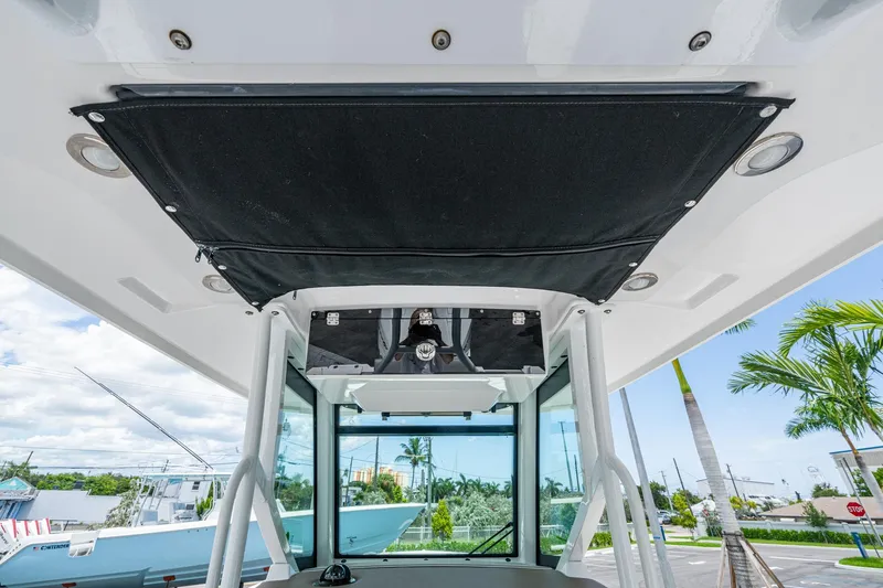 Slide: The Image of 2019 Blackfin 272 CC boat interior with overhead storage and modern design. - 37