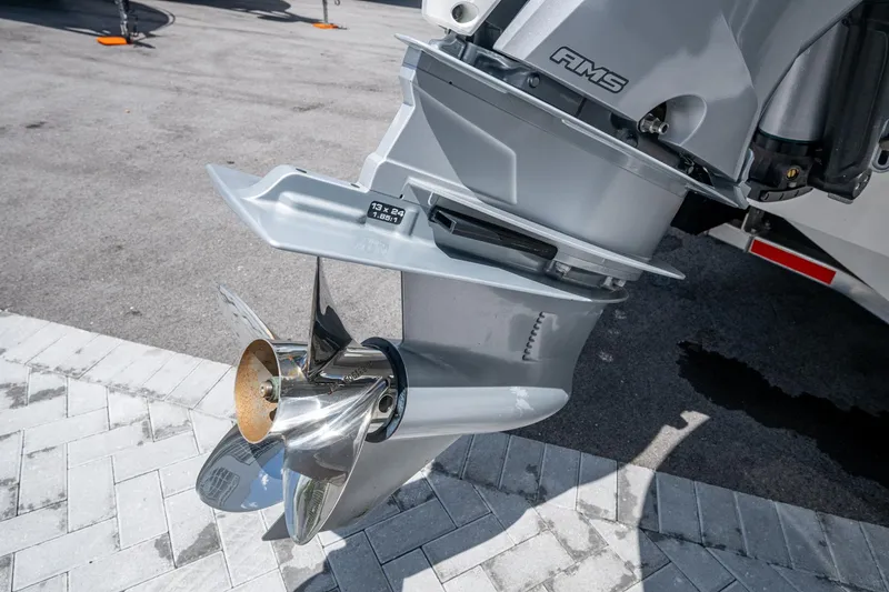 Slide: The Image of Close-up of 2019 Blackfin 272 CC boat propeller and outboard motor. - 44