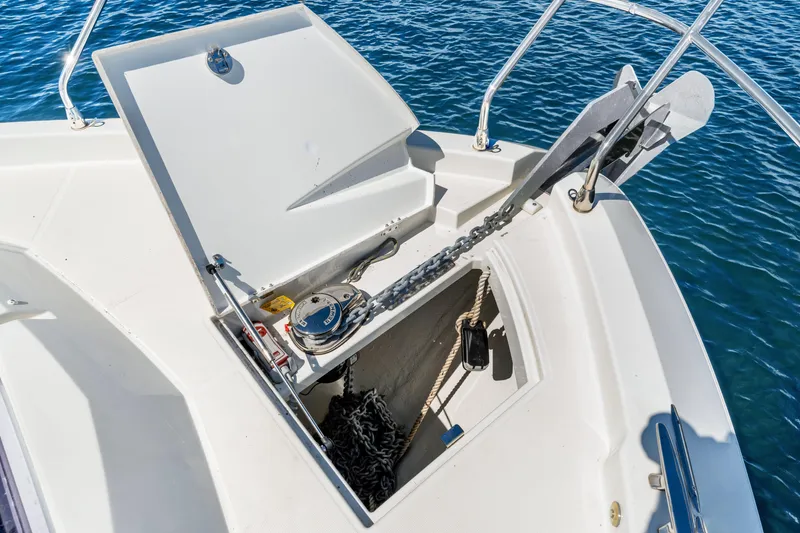 Slide: The Image of Bow anchor compartment of 2024 Beneteau Gran Turismo 45 yacht on water. - 43
