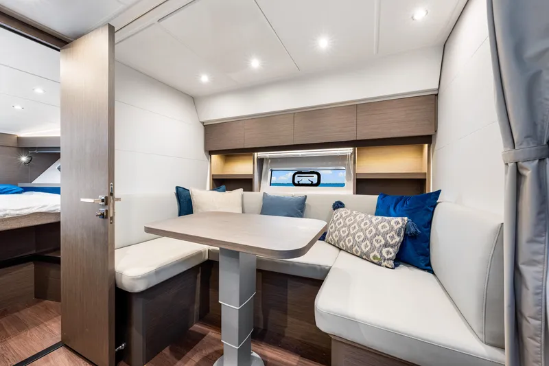 Slide: The Image of Luxurious interior of 2024 Beneteau Gran Turismo 45 yacht with elegant seating and modern decor. - 61