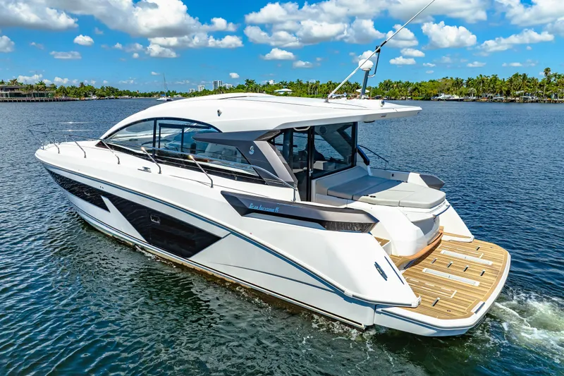 Slide: The Image of 2024 Beneteau Gran Turismo 45 yacht cruising on a sunny day, showcasing sleek design. - 7