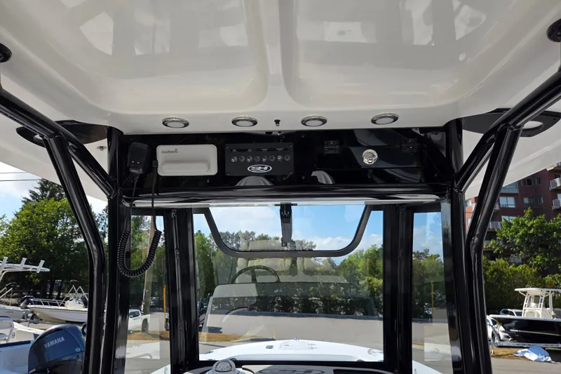 Slide: The Image of 2026 Sea Hunt Gamefish 27 helm with Garmin electronics and forward seating. - 10