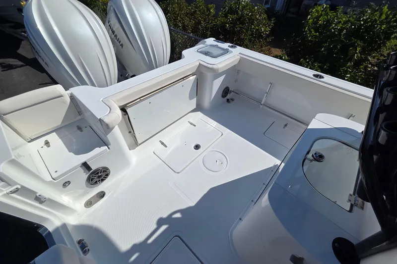 Slide: The Image of 2026 Sea Hunt Gamefish 27 Forward Seating boat deck with Yamaha engines. - 11