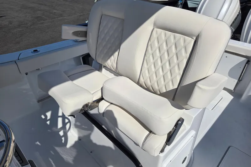 Slide: The Image of Luxurious seating on 2026 Sea Hunt Gamefish 27 Forward Seating boat, featuring diamond-stitched upholstery. - 13