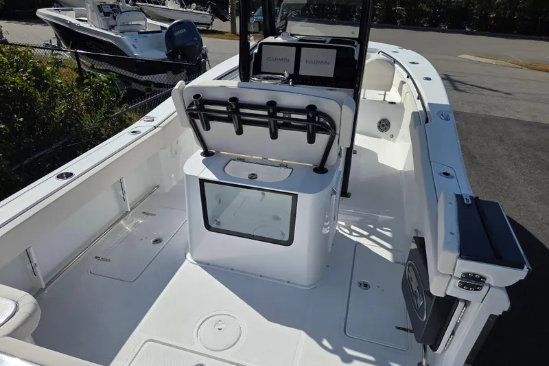 Slide: The Image of 2026 Sea Hunt Gamefish 27 Forward Seating boat interior with Garmin displays and rod holders. - 8