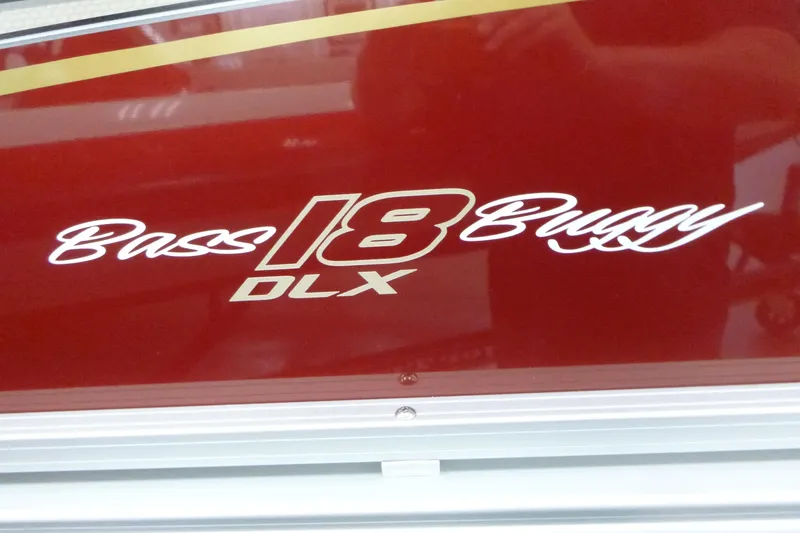 Slide: The Image of 2025 Sun Tracker Bass Buggy 18 DLX logo on red background. - 9