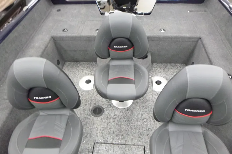 Slide: The Image of 2026 Tracker Pro Guide V-175 WT boat interior storage compartment open. - 8