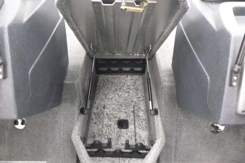 Slide: The Image of Open storage compartment in 2026 Tracker Pro Guide V-175 WT boat, showing interior contents. - 9