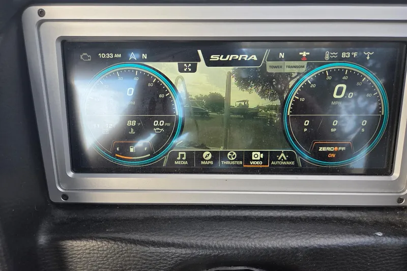 Slide: The Image of Dashboard display of 2021 Supra SE 450 with speedometer and control options. - 12