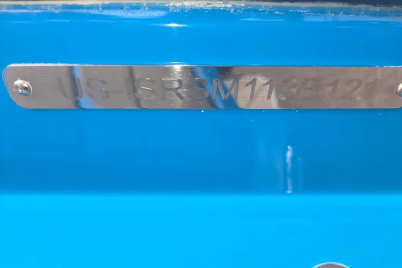 Slide: The Image of 2021 Supra SE 450 boat hull identification number on blue background. - 14