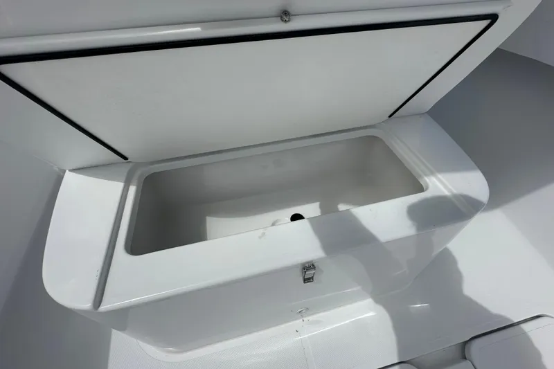 Slide: The Image of Open storage compartment on 2026 Bluewater 25t boat, showcasing interior space. - 13