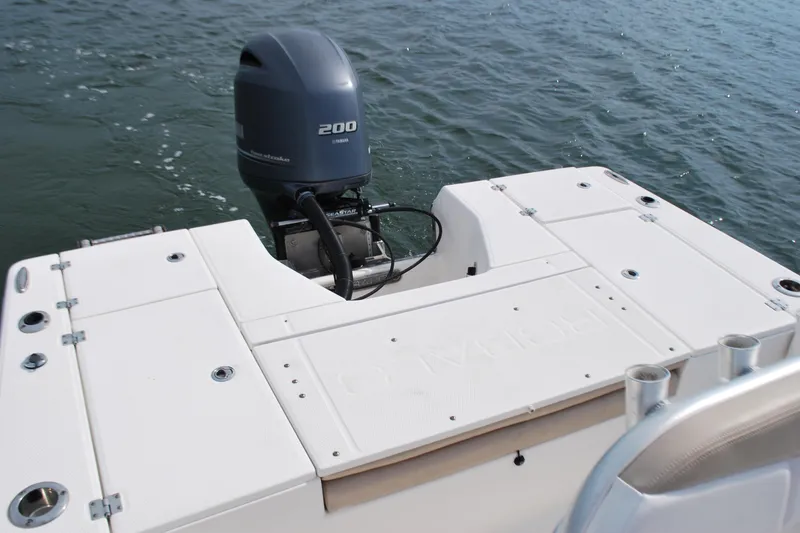 Slide: The Image of 2016 Robalo 226 Cayman boat with Yamaha 200 engine on water. - 12