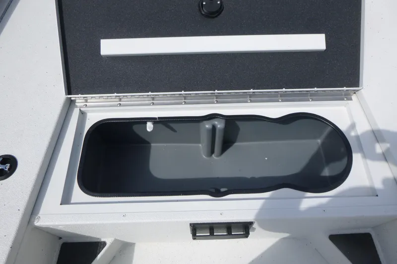 Slide: The Image of Open storage compartment in 2025 Ranger RB210 boat. - 10