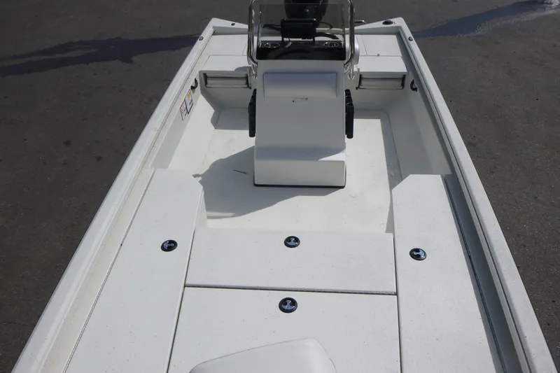 Slide: The Image of 2025 Ranger RB210 boat interior with center console and seating. - 5