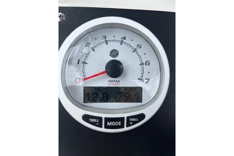Slide: The Image of Tachometer display on 2021 Mako 214 CC boat showing RPM and voltage readings. - 17