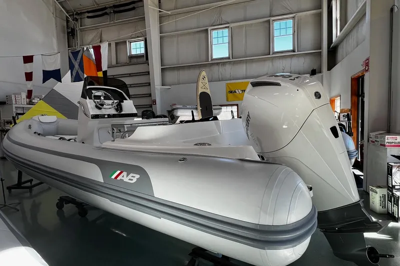 Slide: The Image of 2024 AB Inflatables Oceanus 21 VST boat displayed in a showroom. - 2