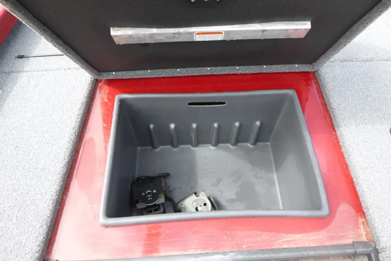 Slide: The Image of Open storage compartment in 2024 Ranger RT178 boat, featuring a spacious interior. - 11