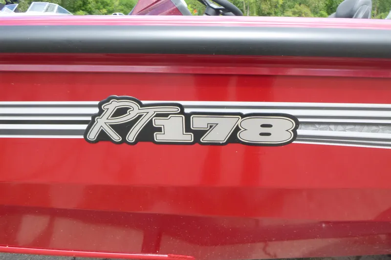 Slide: The Image of 2024 Ranger RT178 boat logo on red exterior. - 16