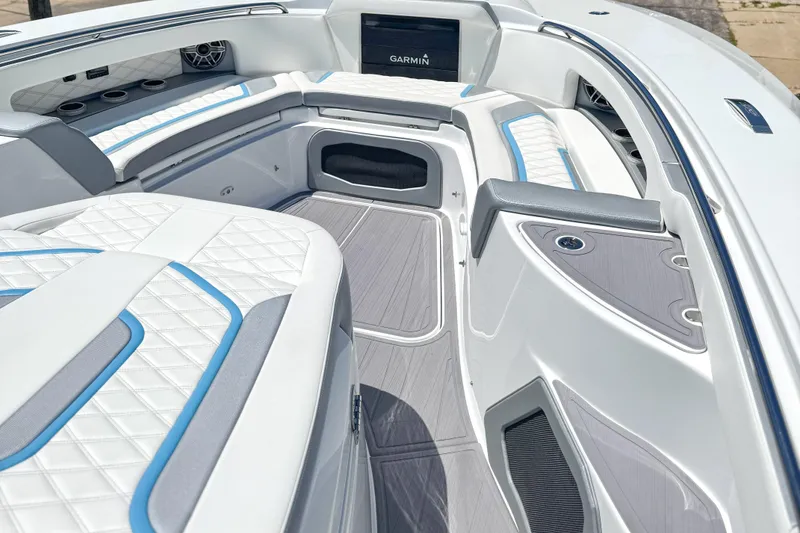 Slide: The Image of Luxurious interior of 2023 MTI 50 V boat with white and blue seating. - 10