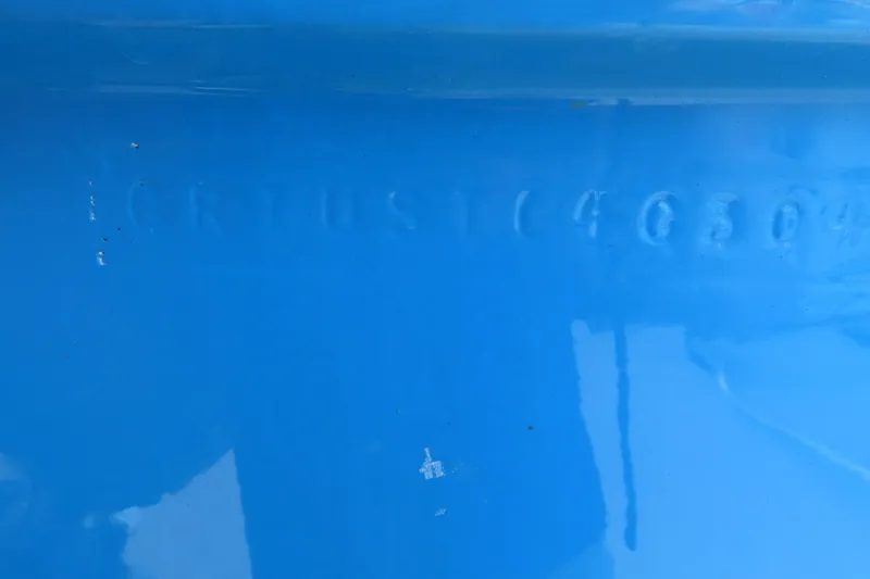 Slide: The Image of Close-up of blue hull with embossed serial number on 2004 Cigarette 38 Top Gun TS boat. - 13