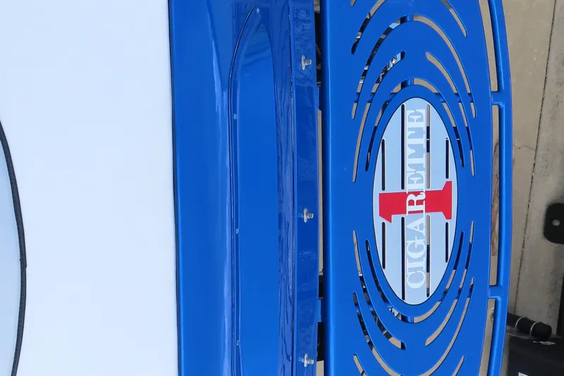 Slide: The Image of Blue and white 2004 Cigarette 38 Top Gun TS boat with logo detail. - 5