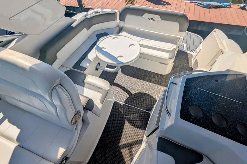 Slide: The Image of Luxurious interior of 2013 Monterey 280 Sport Yacht with plush seating and table. - 14