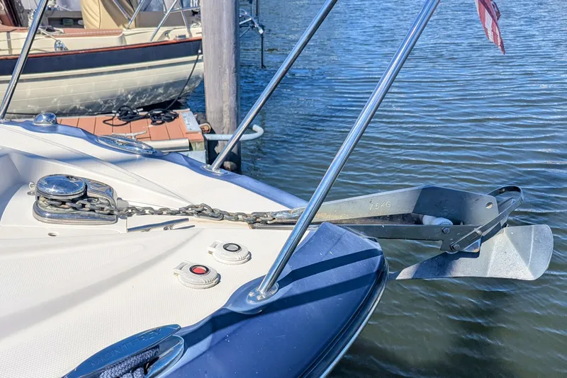 Slide: The Image of Bow of 2013 Monterey 280 Sport Yacht with anchor and chain in marina. - 37