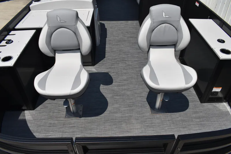 Slide: The Image of Two white seats on a 2026 Lowe SF 212 WT Sport Fish boat deck. - 15