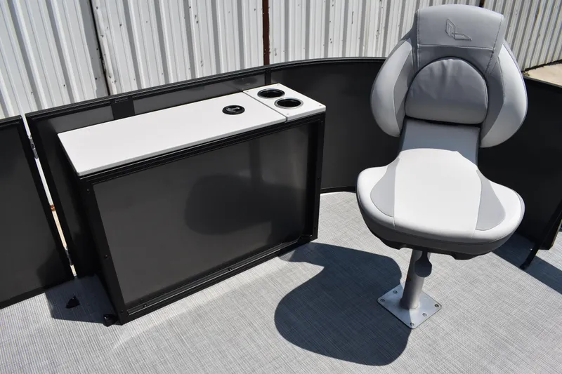 Slide: The Image of 2026 Lowe SF 212 WT Sport Fish boat interior with a swivel chair and console. - 18