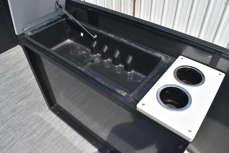 Slide: The Image of Lowe SF 212 WT Sport Fish 2026 boat sink and cup holders detail. - 20